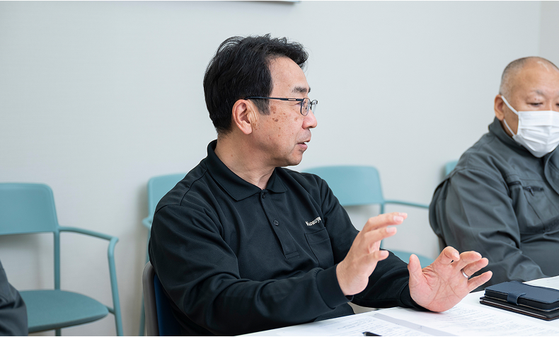 生産技術部　部長　常務取締役兼管理　本部長　堀功氏