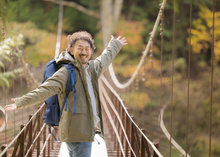 撮影風景。「楽しみながら創りつづけること」を意識して笑顔で現場にあたる。