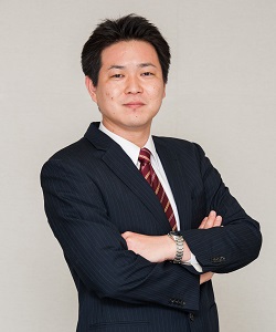 松長根 幸治